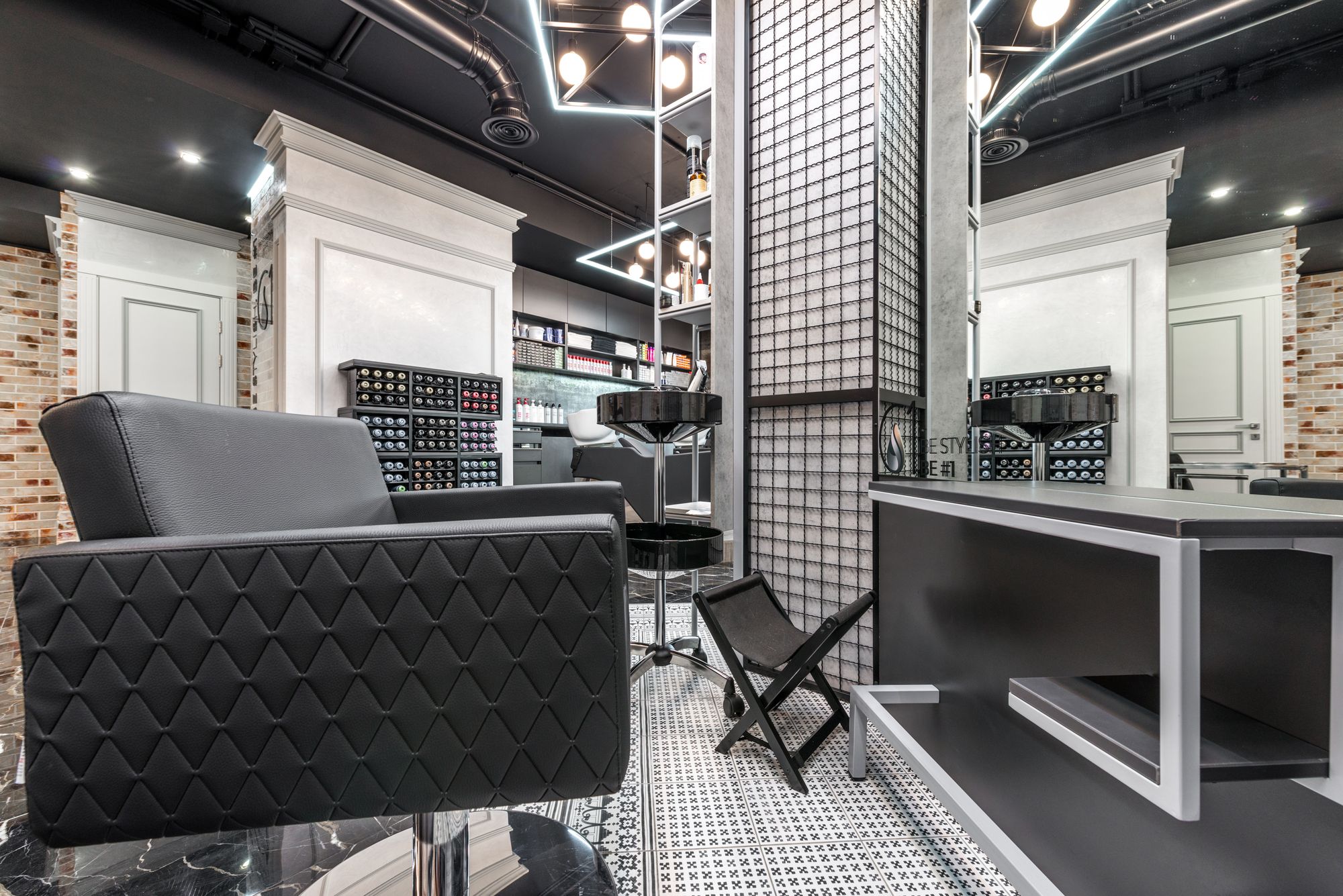 Premium salon interior with leather chair and mirror